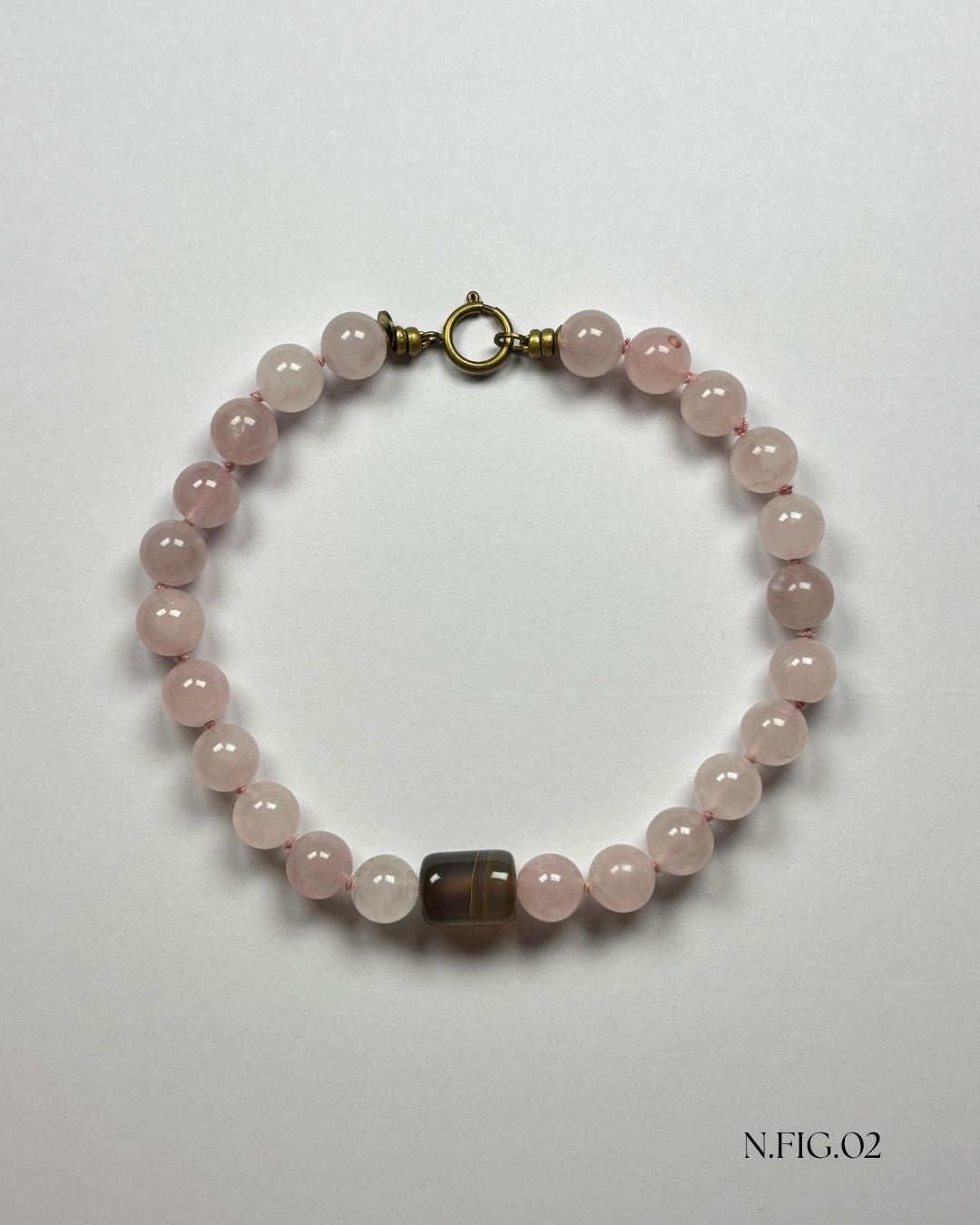 16-inch necklace featuring soft pink rose quartz and grey lace agate beads, elegantly strung on silk. The gentle hues evoke calm and emotional warmth.