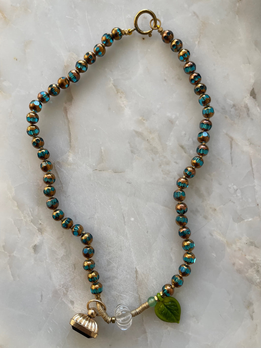 The Be Nice or Leaf necklace